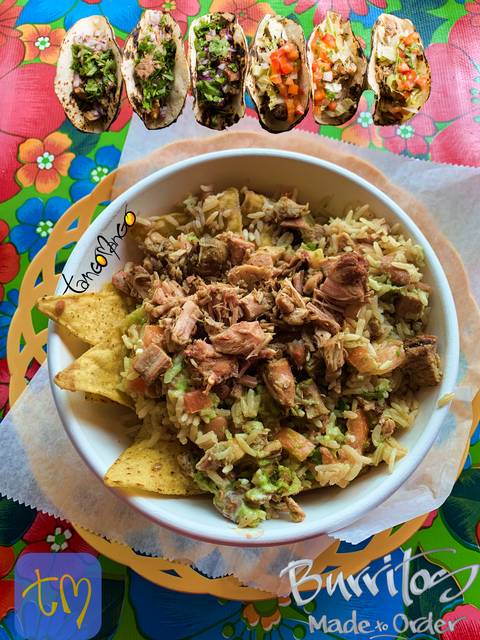 Loaded nachos on a floral platter