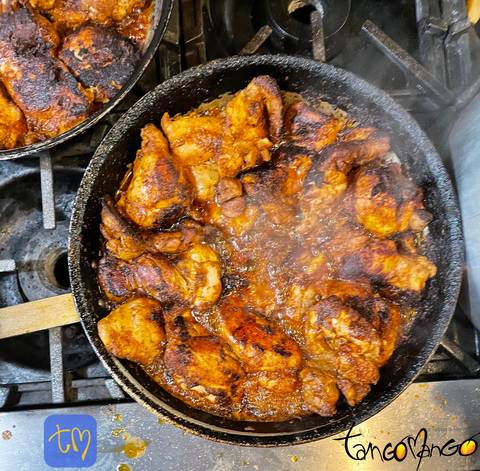 Wings in a cast-iron skillet